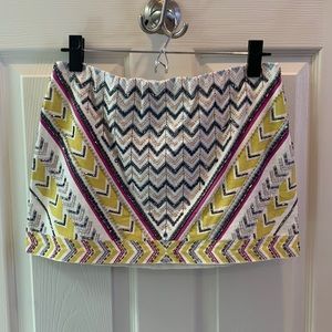 Colorful, beaded mini skirt.